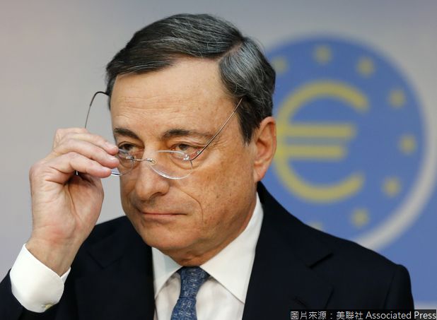 President of European Central Bank Mario Draghi adjusts his glasses during a news conference in Frankfurt, Germany, Thursday, Nov. 7, 2013, following a meeting of the ECB governing council. The ECB lowered its key interest rate from 0.5 to 0.25 per cent. (AP Photo/Michael Probst)